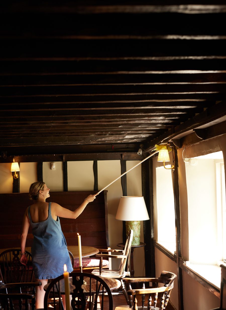 team member setting up dining area